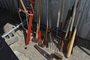 lot 39 image: Tools, shovels, axe, pick, maul