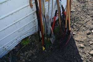 lot 71 image: Axe, Pruners, rakes, canes