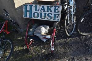 lot 87 image: Push wheel chair (needs wheel)