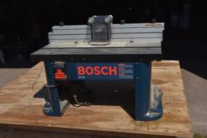 lot 97 image: Bosch table wPorter Cable Router