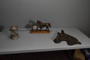 lot 253 image: Horse and clock, head plaque