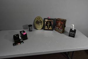 lot 215 image: Jack D. Bank, Tin, Mirror, Bottle stopper