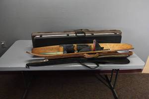 lot 319 image: 5) Hard a & soft cases & Skis