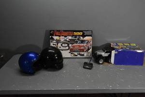 lot 384 image: 2) Helmets, Race car set, Jeep