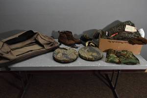 lot 430 image: Hunting clothes, swival seats