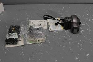 lot 436 image: Garmin, Cannon &amp Olympus Camera