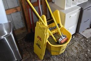 lot 82 image: 2) Mops, bucket, 2) signs and brooms
