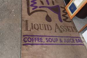 lot 86 image: Liquid Assets rug and wood frame