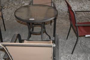 lot 91 image: Patio table with two brown chairs (seat has some separations)