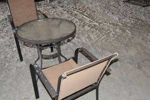 lot 92 image: Patio table with two brown chairs