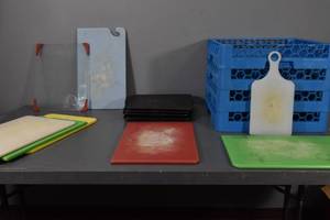 lot 139 image: 8) Cutting boards, 4) Blue racks, 4) trays
