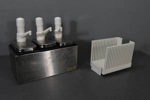 lot 128 image: San Jamar SS 3 bay dispenser & West Bend slicer