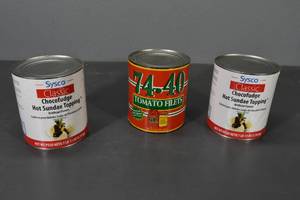 lot 130 image: 2) Hot Fudge, 1) Tomato gallons