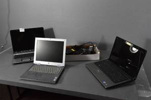 lot 165 image: Three laptopsno hard drives and cords and scanner