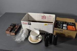 lot 164 image: Expresso Capsules. Phillips 50 w bulbs, 2 set of 4 adjustable legs