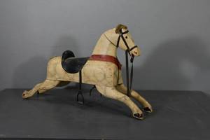 lot 102 image: Wooden kids horse
