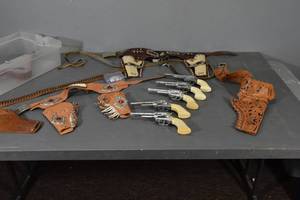 lot 105 image: Toy guns and holsters