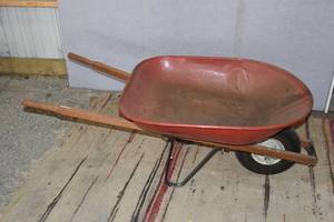 lot 86 image: Red wheel barrow