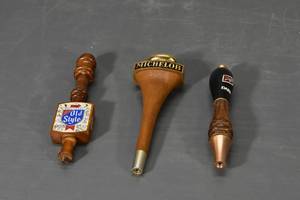 lot 145 image: 3 beer tappers1 corkscrew