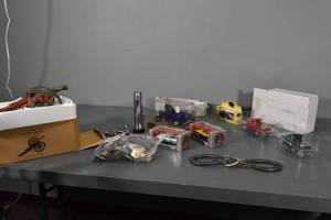 lot 260 image: Model trucks, cannon, pins
