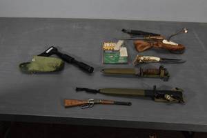 lot 311 image: Lever action cap, hacket, knives