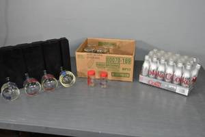 lot 320 image: Empty tin Coke bottles, Hamms