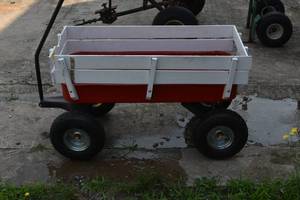 lot 473 image: Red Wagon with wood sides