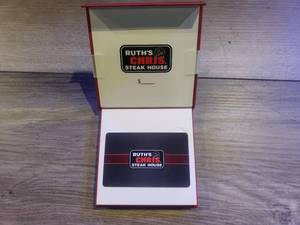 lot 86 image: $100 Dollar gift card to Ruths Chris Steak House