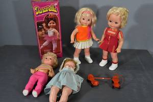 lot 114 image: Five Dolls