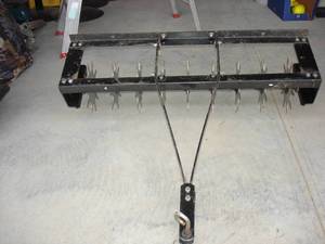 lot 59 image: LAWN AEREATOR PULL BEHIND