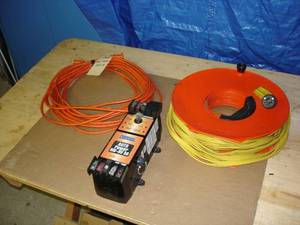 lot 12 image: RV SURGE GUARD, KEYS EXTENSION CORDS