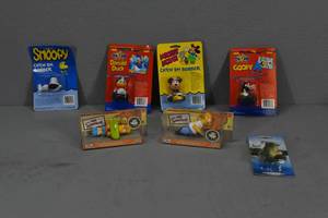 lot 23 image: Snoopy & Simpson lures and bobbers