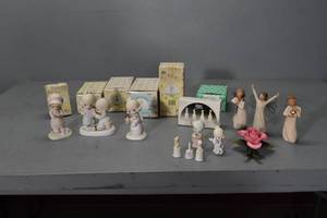 lot 14 image: Precious Moments-1 nicked finger