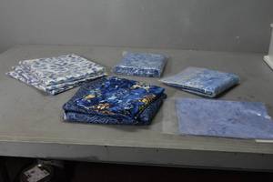 lot 33 image: Blue Batik & Blue yardage
