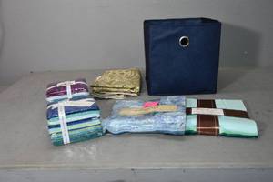 lot 65 image: 2 Layer cakes, 2 fat qtr bundles