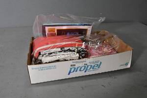 lot 84 image: 3) Red packages quilt & purse kit