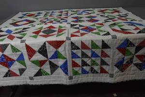 lot 143 image: 12 square triangle quilt 48 x 48