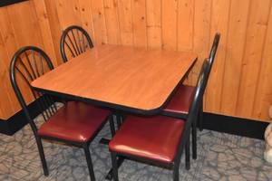 lot 59 image: Table with four red seat chairs