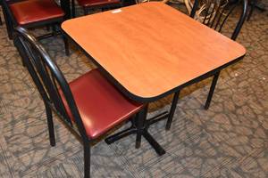 lot 68 image: Small table & two red chairs