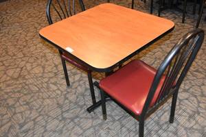 lot 69 image: Small table & two red chairs