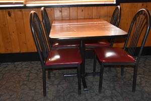 lot 84 image: Table & four red chairs 46 x 30