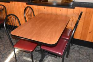 lot 85 image: Table & four red chairs 46 x 30