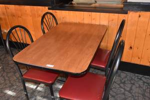 lot 87 image: Table & four red chairs 46 x 30
