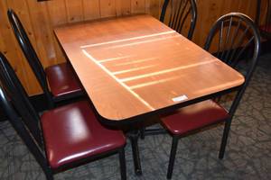 lot 86 image: Table & four red chairs 46 x 30