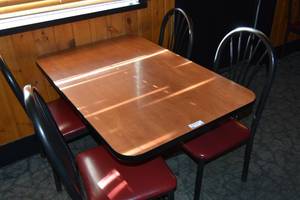 lot 88 image: Table & four red chairs 46 x 30