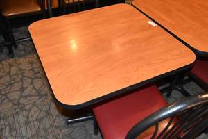 lot 110 image: Small table & two red chairs