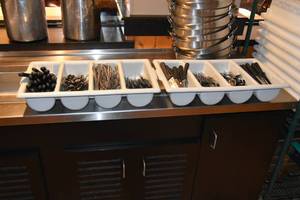 lot 178 image: Plastic silverware totes, 2 full