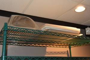 lot 183 image: 2 Bread covers. 5 trays. Glass S &amp P