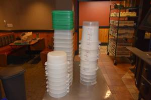 lot 240 image: Stack of 13 Cambro containers wlids