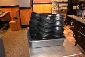 lot 248 image: Tub of 23 black salad bar inserts Carlisle